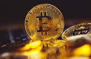 O guia básico do Bitcoin: o que é? Como investir?