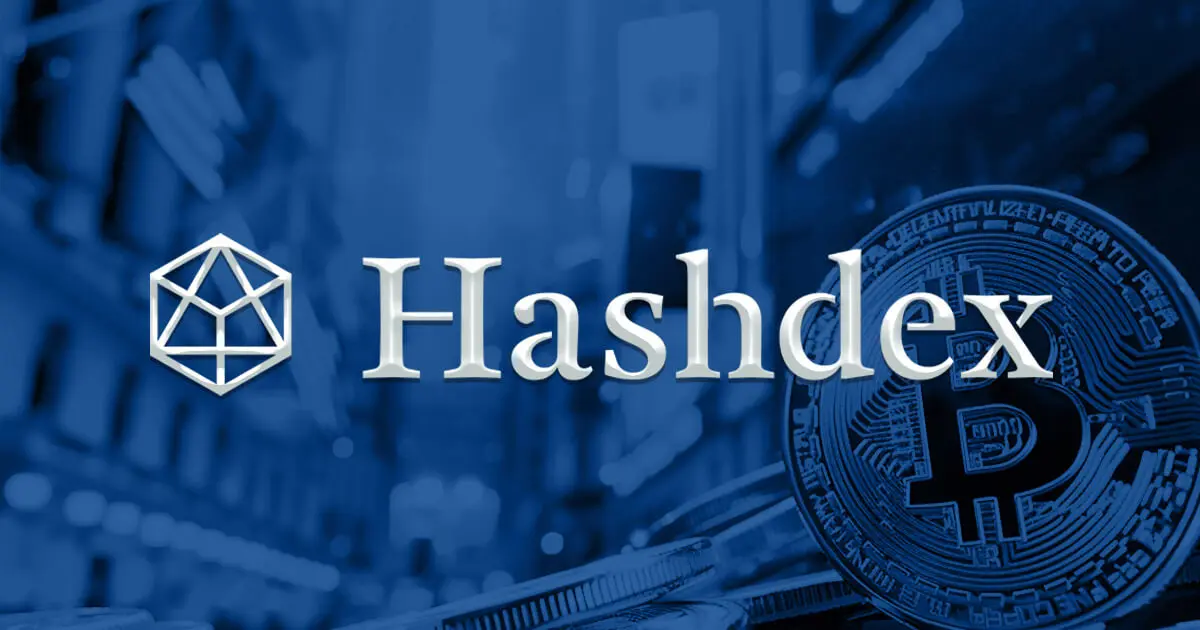 Hashdex logo overlaying a blurred cityscape with Bitcoin graphics.